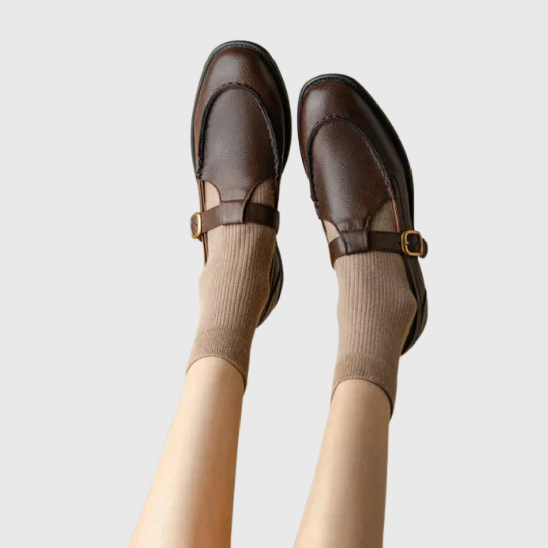 Lea round-toe retro stitched leather flats in rich brown finish