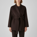 Blaire belted wrap jacket featuring a waist-tying belt and smooth structured fabric.