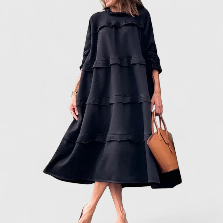 Genevieve high-neck midi dress featuring long sleeves and dramatic cascading tiered ruffles