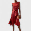 Giselle asymmetrical sleeveless midi dress showing the fluid side draped detail