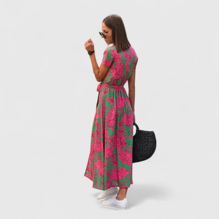 Colette wrap-style midi dress displaying the side slit and tied waist belt