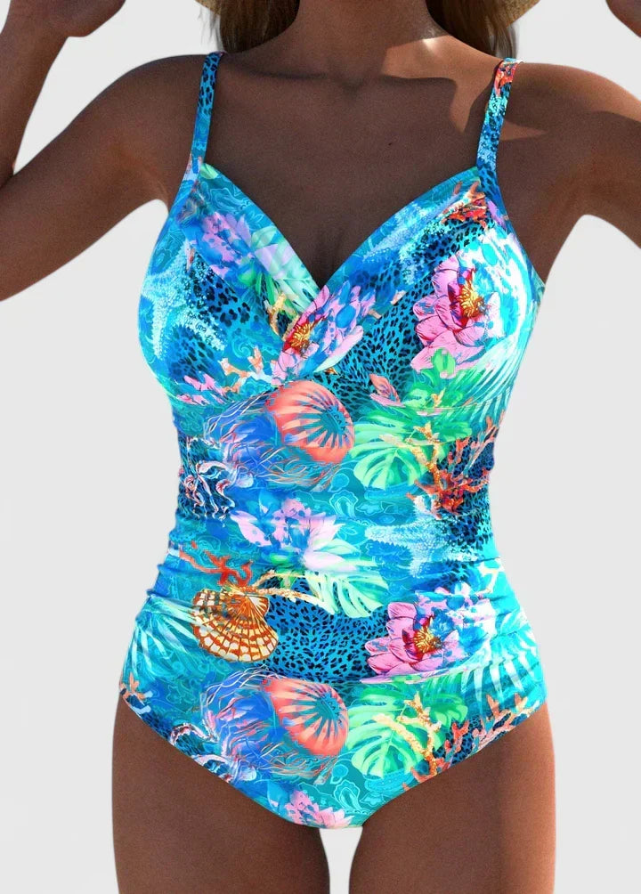Clemence sophisticated high-waisted swimsuit with ocean-inspired print and cutout detail