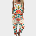 Amandine light base overalls with coral and green floral print