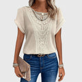 Lucie Ibiza lace accent blouse displaying delicate feminine lace trim
