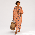 Selma long coral caftan dress with star pattern print