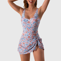 Clara one-piece swimsuit featuring side ruching and flattering skirt overlay