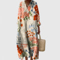 Sereia dress displaying its artistic nature-inspired floral print and easy fluid drape