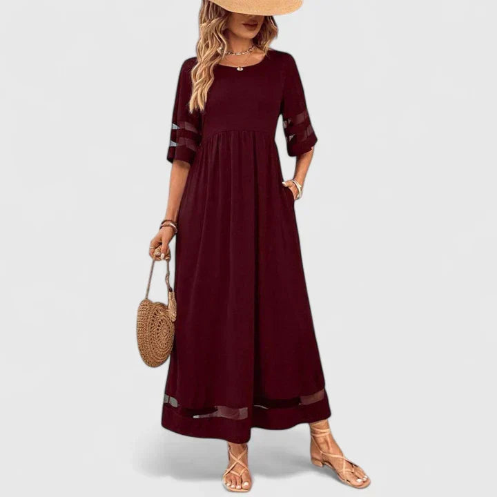 Delymarina Empire Waist Midi Dress featuring a soft flowing tummy-concealing skirt