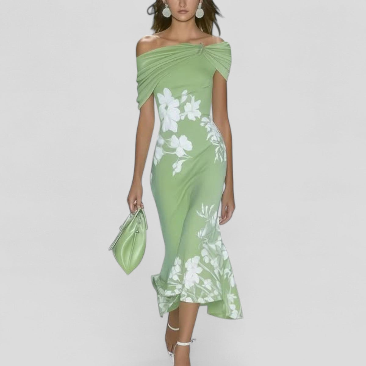 Model turning to show the flared ruffle hemline on the Isabelle floral midi dress
