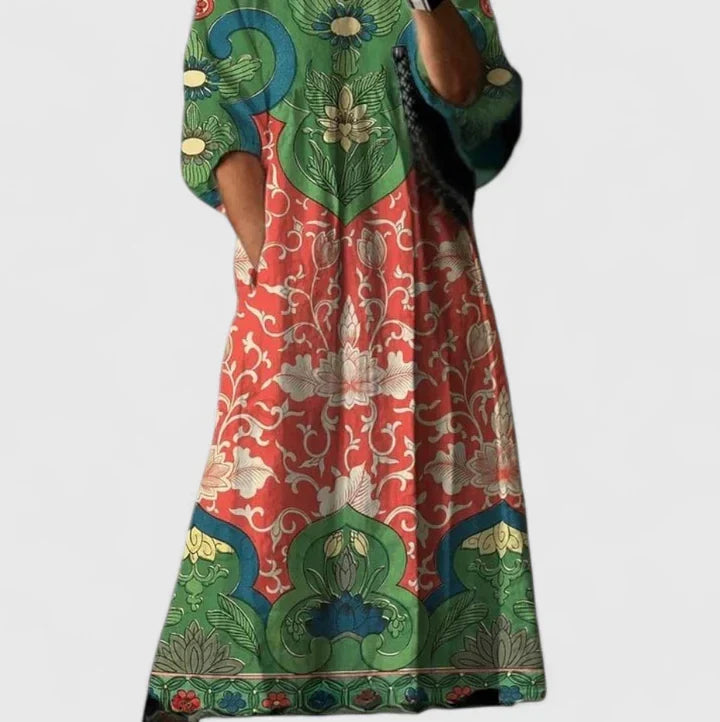 Mireia Mediterranean print midi dress with a bright floral design and deep V-neckline