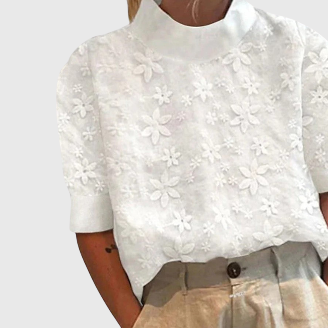 Amélie floral embroidered high-neck blouse showing embroidery detail