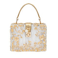Apolonie acrylic box clutch bag with gold floral accents