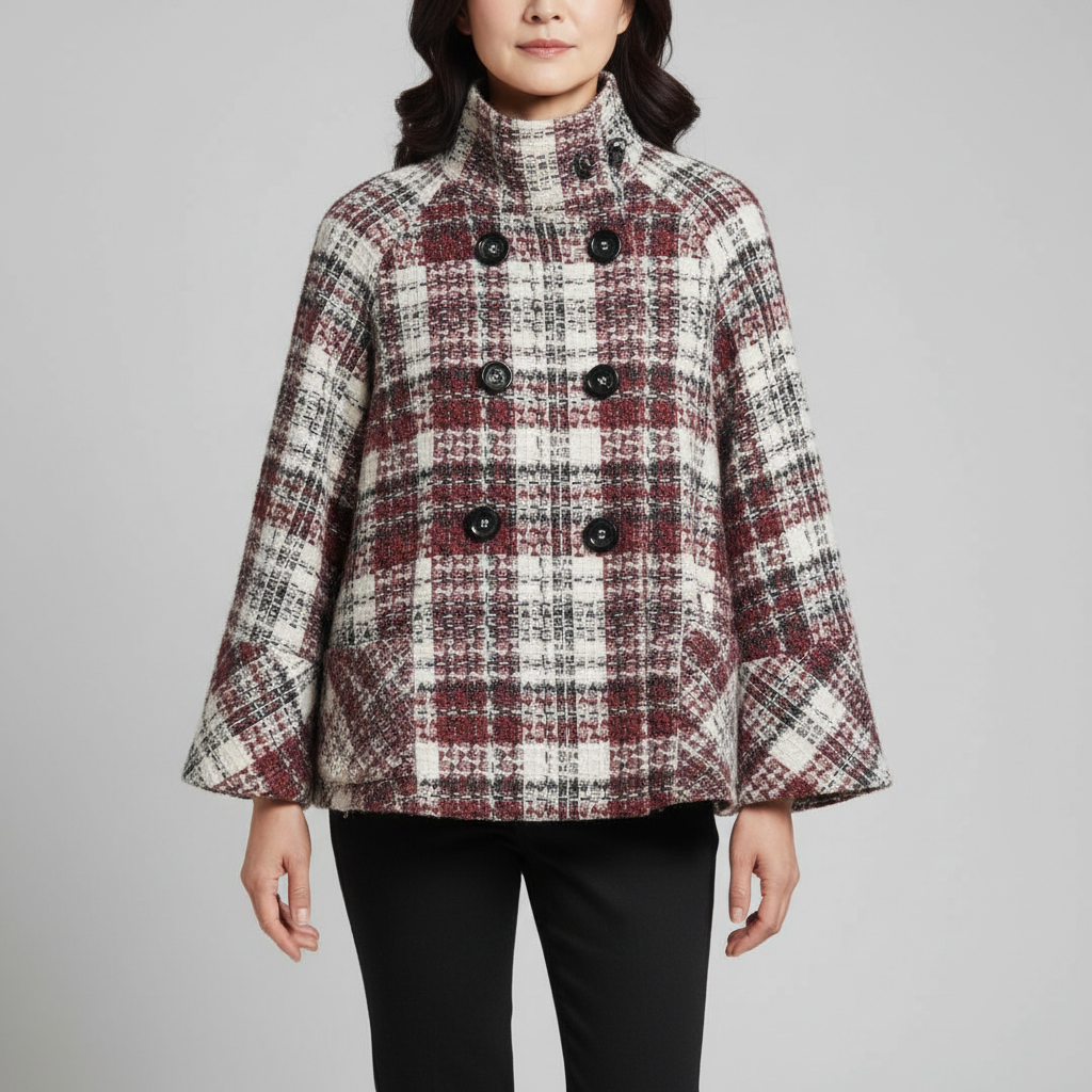 Beatrice plaid cape jacket showing double-breasted buttons and wide draped cape sleeves.