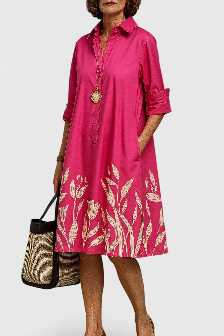 Model wearing the Camille midi dress with a shirt collar design and subtle floral details