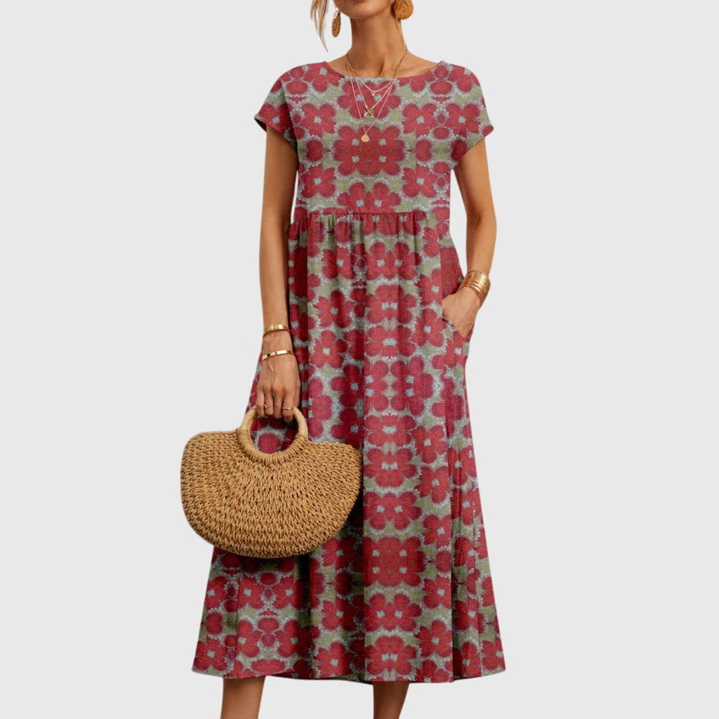 Valencia flowy floral dress highlighting its soft floral motif and airy fit