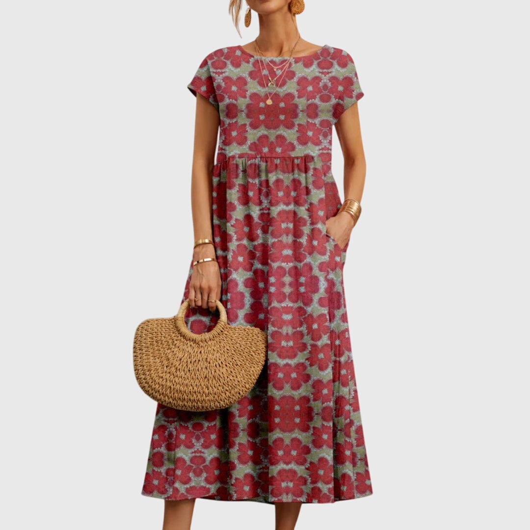 Valencia flowy floral dress highlighting its soft floral motif and airy fit