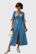 Jacqueline denim dress showing off its cinched waist silhouette