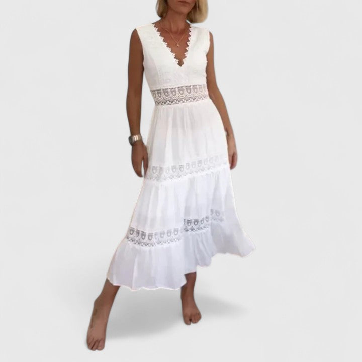Maya elegant midi dress featuring delicate lace crochet details and a airy ruffled skirt