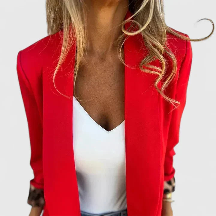 Rosavionne reversible blazer showing sleek exterior and leopard lining