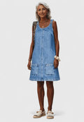 Dominique denim midi dress featuring large front utility pockets and a relaxed cut