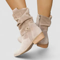 Claire western boots in soft suede featuring a 4cm block heel