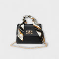 Apolonie leather handbag with decorative scarf